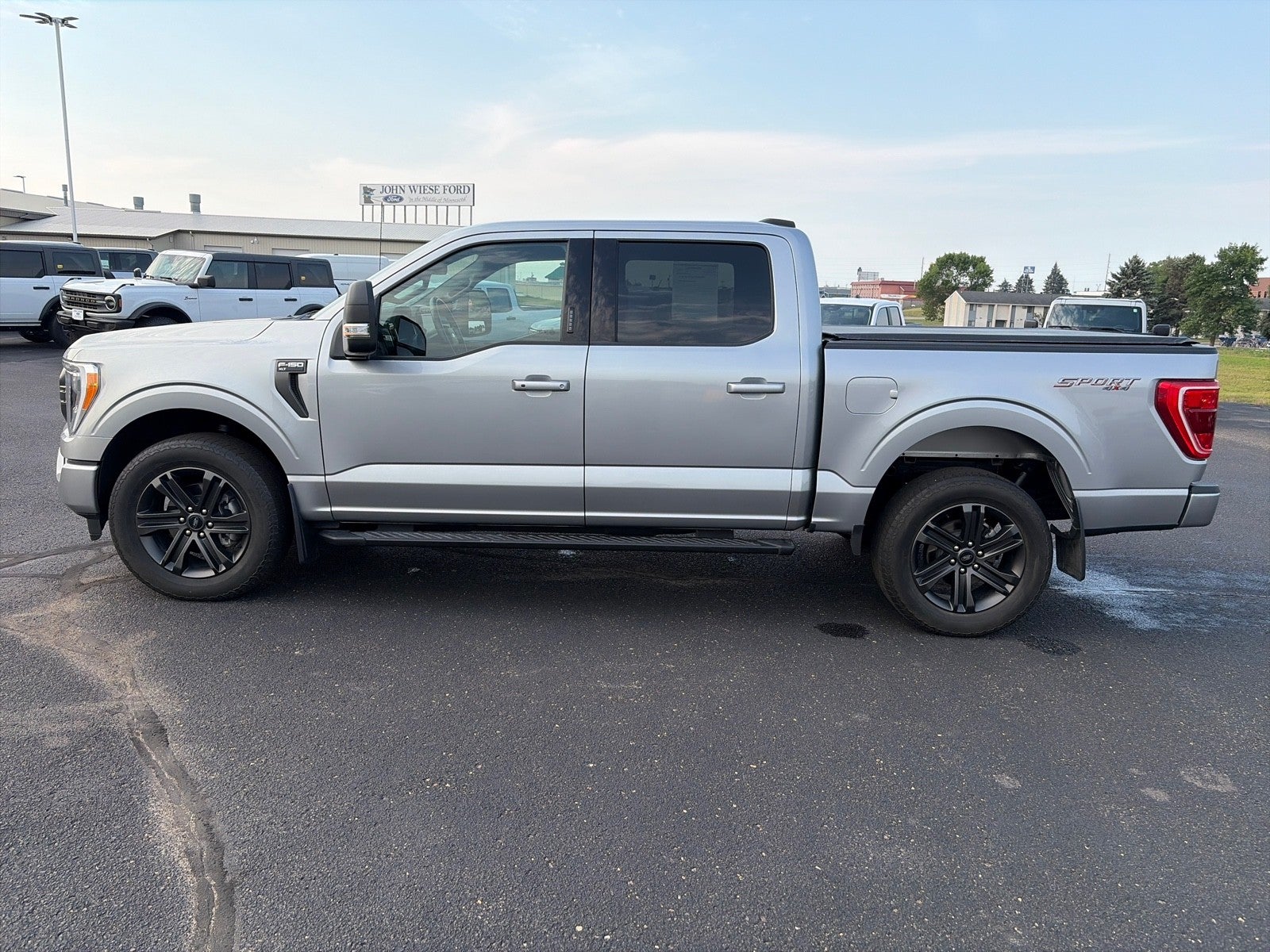 Used 2022 Ford F-150 XLT with VIN 1FTFW1E86NKE78402 for sale in Sauk Centre, Minnesota